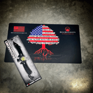 AMERICAN RESISTANCE AND DEVIL DOG CONCEPTS ARMORER'S MAT WITH TREE OF LIBERTY ART AND ADVANCED ARMORER'S WRENCH.