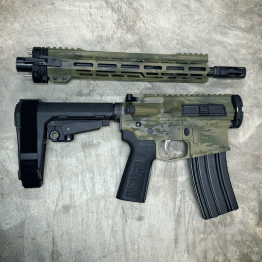 AMERICAN RESISTANCE AR TAKEDOWN PISTOL WITH 13.7" BARREL, 11" MLOK HANDGUARD, CRY HAVOC TACTICAL QRB AND "DIRTY WOODLAND" CERAKOTE PATTERN.