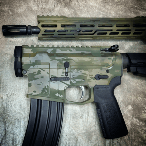 AMERICAN RESISTANCE AR TAKEDOWN PISTOL WITH 13.7" BARREL, 11" MLOK HANDGUARD, CRY HAVOC TACTICAL QRB AND "DIRTY WOODLAND" CERAKOTE PATTERN.